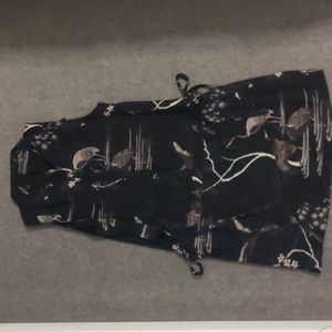 Drop-waist dress with bird pattern details